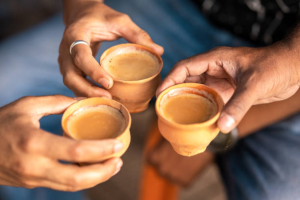 Freshly brewed masala chai in a clay cup