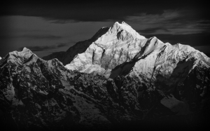 Snow-covered Himalayan mountain peaks in grayscale landscape