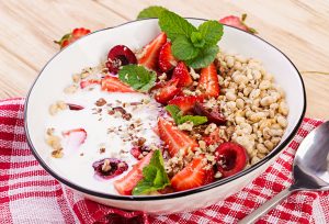 granola yogurt bowl with fresh fruits and nuts healthy snack for weight loss