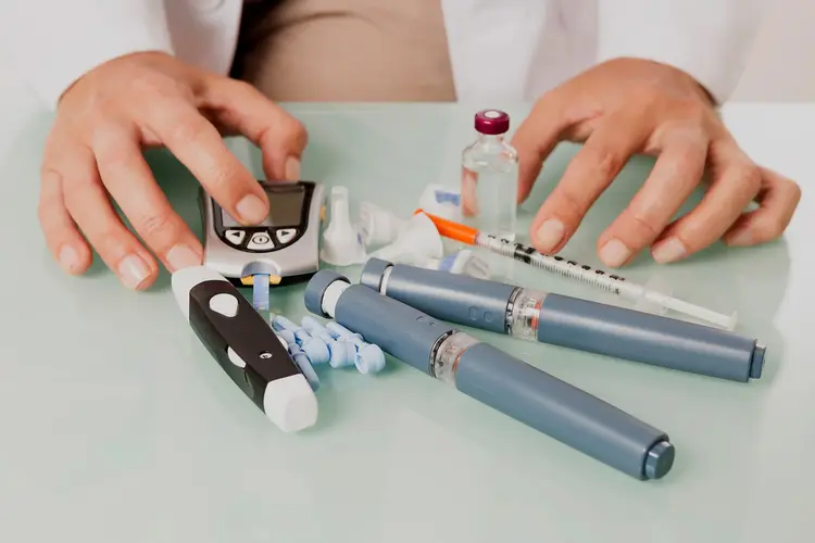 Person's hands arrange Blood Sugar