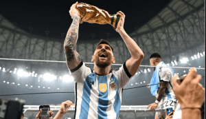 Lionel Messi lifting the world cup trophy 2022
