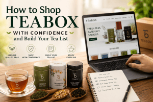 TEABOX online tea shopping guide with a laptop, tea tins, cup of tea, and personalized tea list