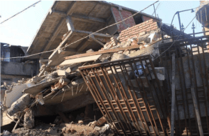 aftermath of earthquakes with broken dilapidated houses and property