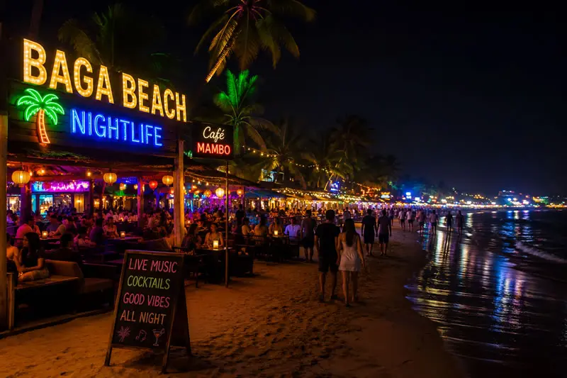 Baga Beach Goa nightlife with colorful lights and evening crowd at Goa beach