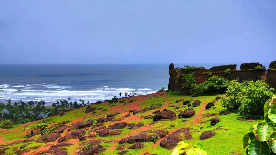 Chapora Fort overlooking the sea with green landscape and rocky terrain