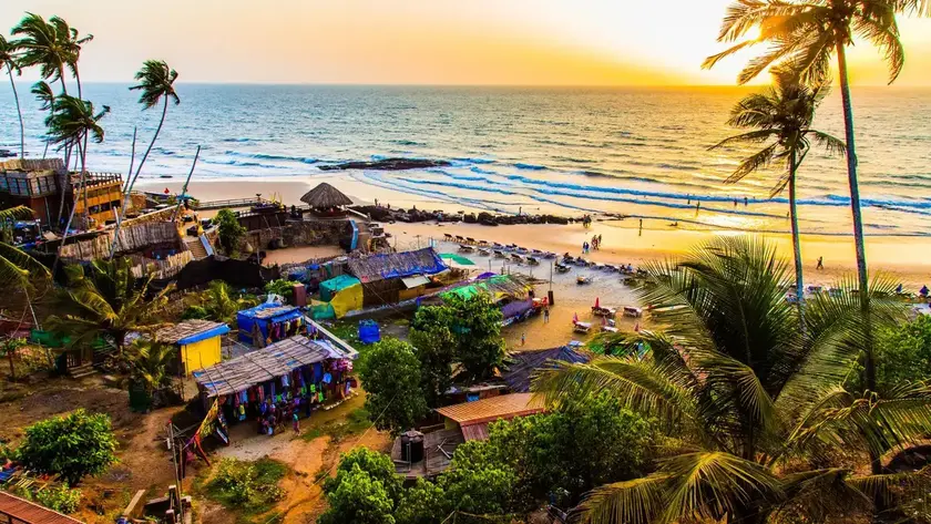 Cabo de Rama Beach Goa with aerial view of sandy coastline, palm trees and sea .Reaching by Madgaon JUnction