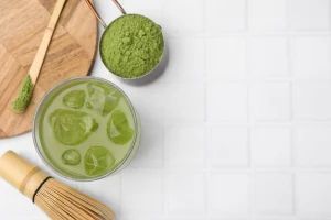 Glass-of-drink-unsweetened-iced- with-ice-cubes-on- a-bright-kitchen- counter